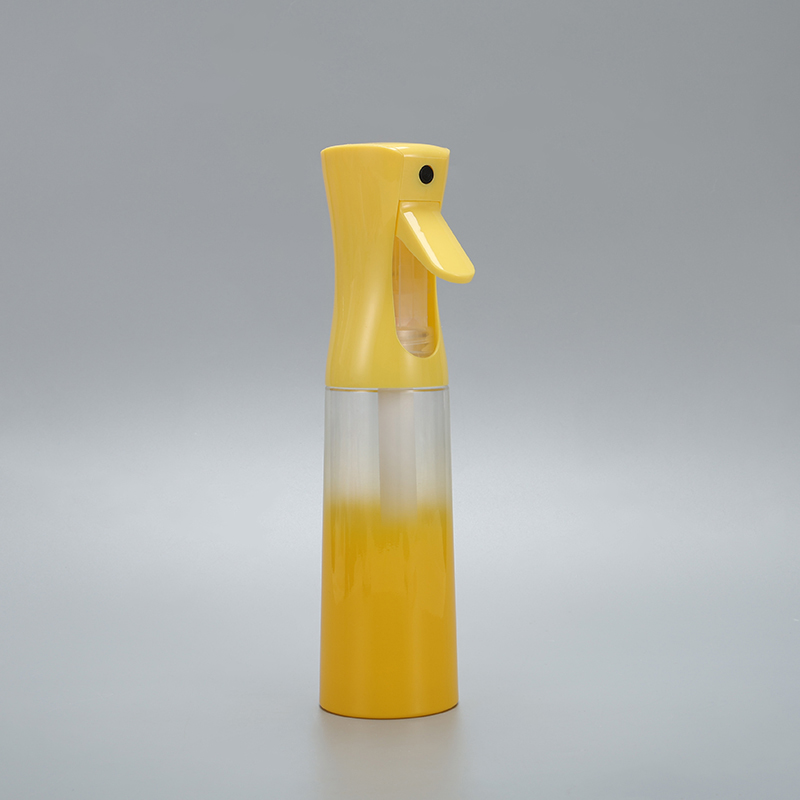 Yellow continuous spray bottle
