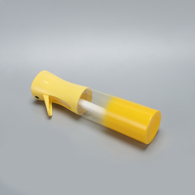Yellow continuous spray bottle