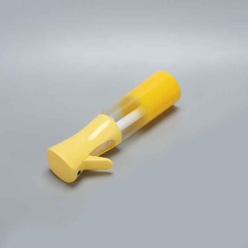 Yellow continuous spray bottle