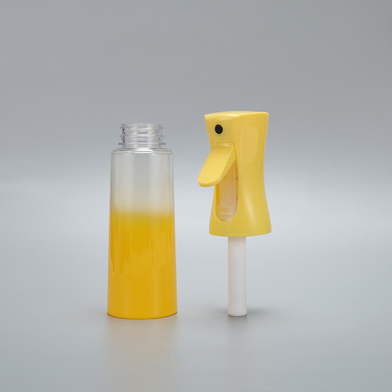 Yellow continuous spray bottle