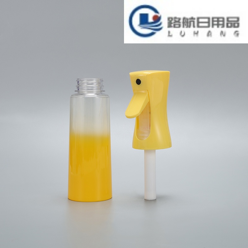 Yellow continuous spray bottle