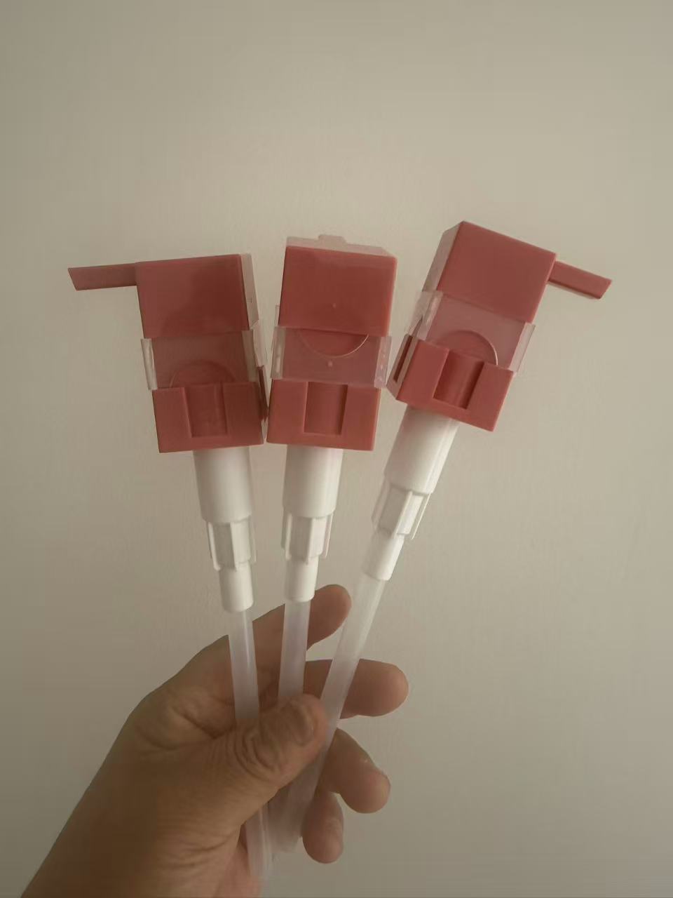 Universal press pump head for personal care products